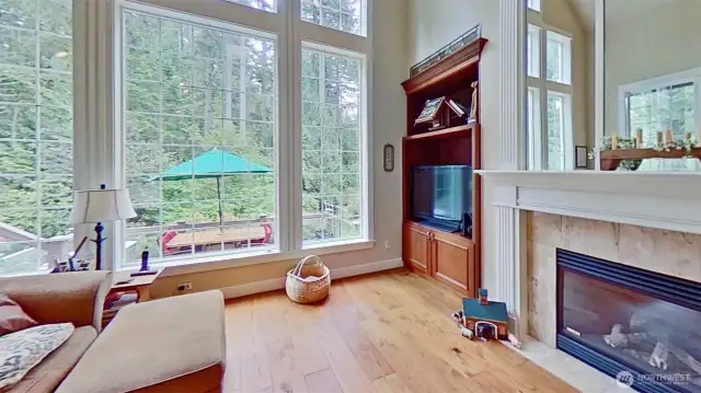 Windows look out on very private backyard setting.