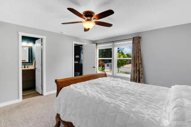 Primary bedroom with walk in closet