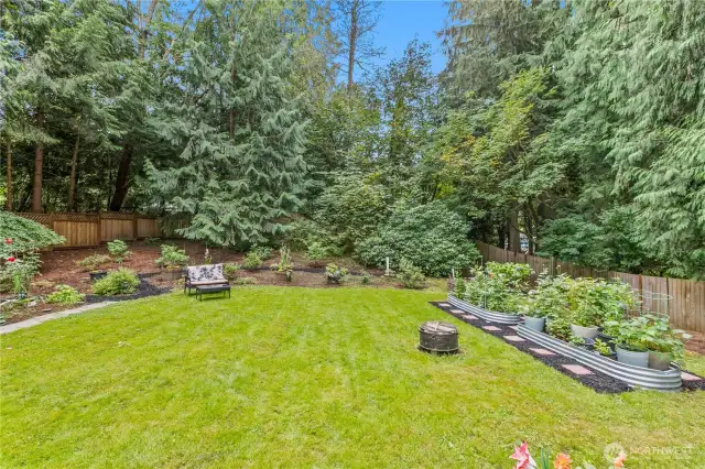 Flat, fully fenced backyard is very private