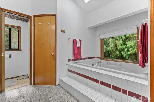 Primary bath has two walk-in closets