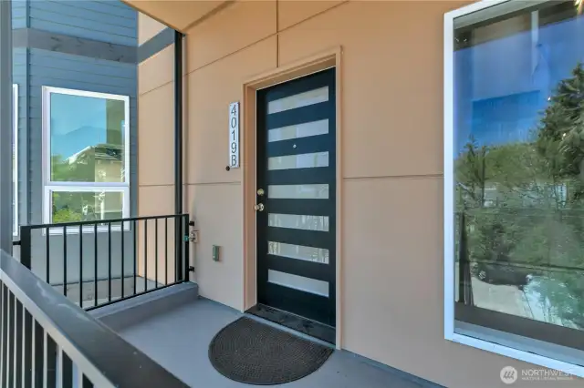 Entry to Unit B, 2-level Penthouse with view rooftop.