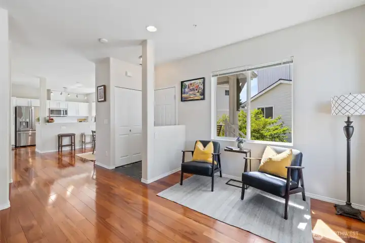 View of the reading/sitting space showing entry and a view of the dining room