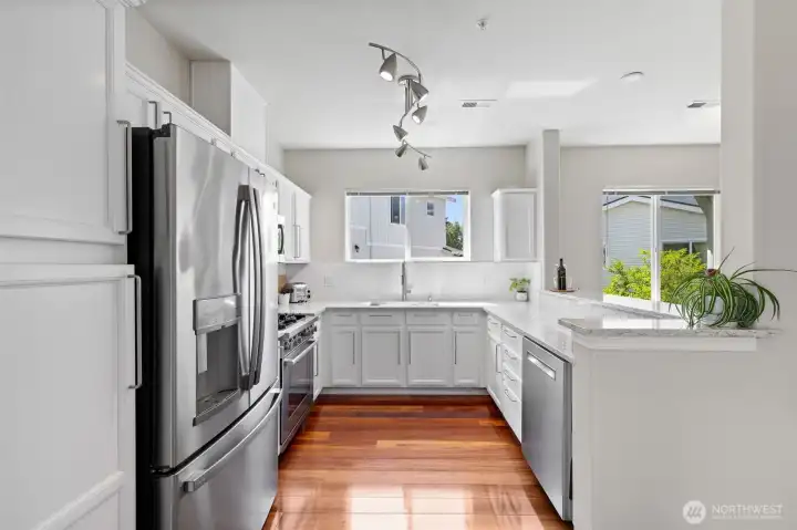 Additional view of kitchen with new SS appliances
