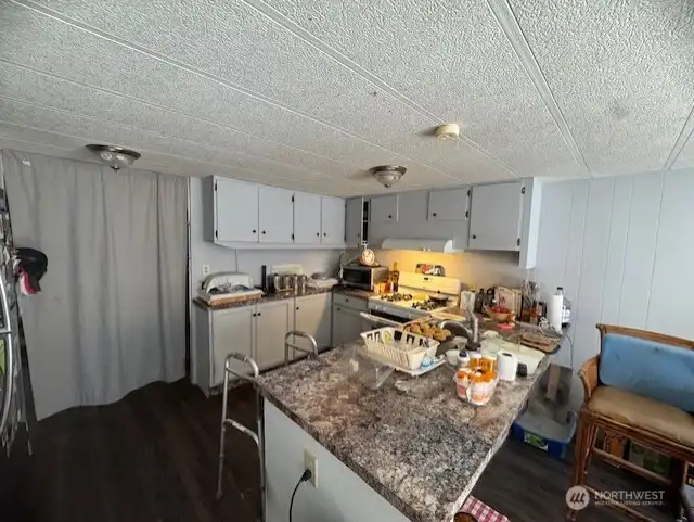 Kitchen. Plenty of storage space.