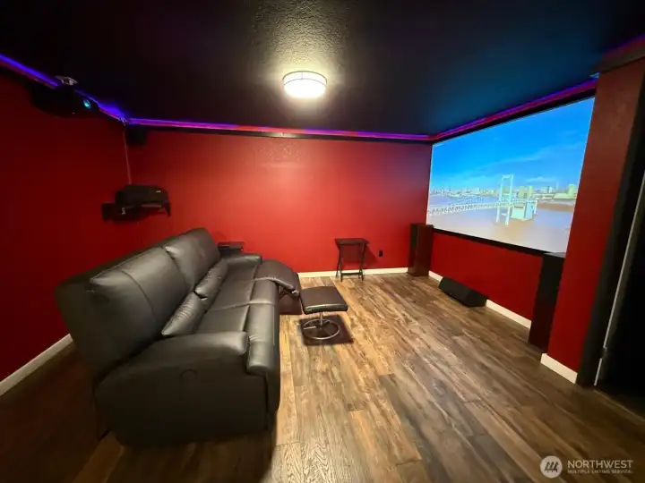 This downstairs theatre room offers the perfect space for your own private movie experience - furniture, projector and equipment stay with home too! Just bring the popcorn and your favorite film!