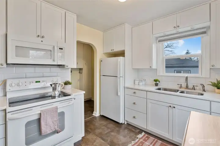 Access to mudroom, laundry and backyard off kitchen