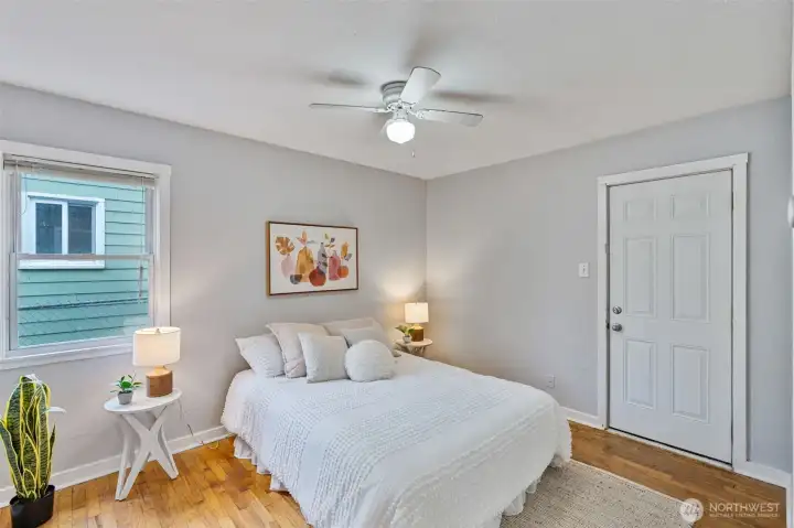 Primary bedroom with backyard access