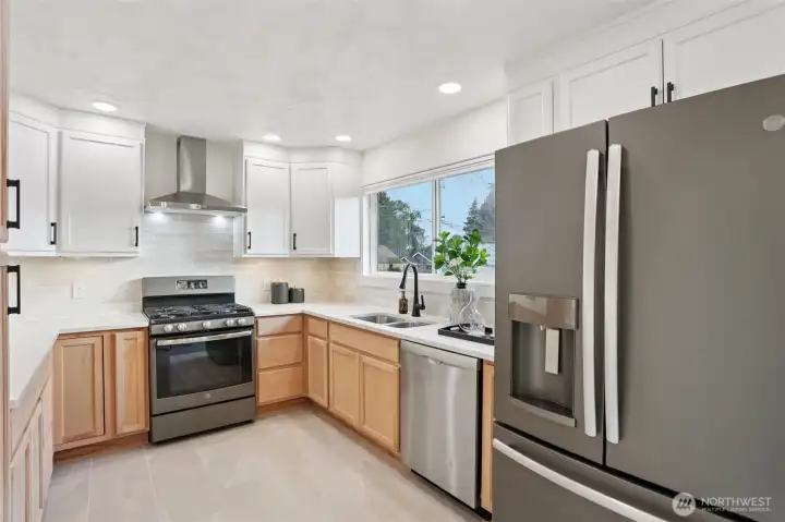 Bright Kitchen with Stainless Steel Appliances