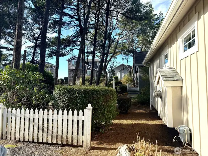 Side of home shows you have lots of privacy between cottages