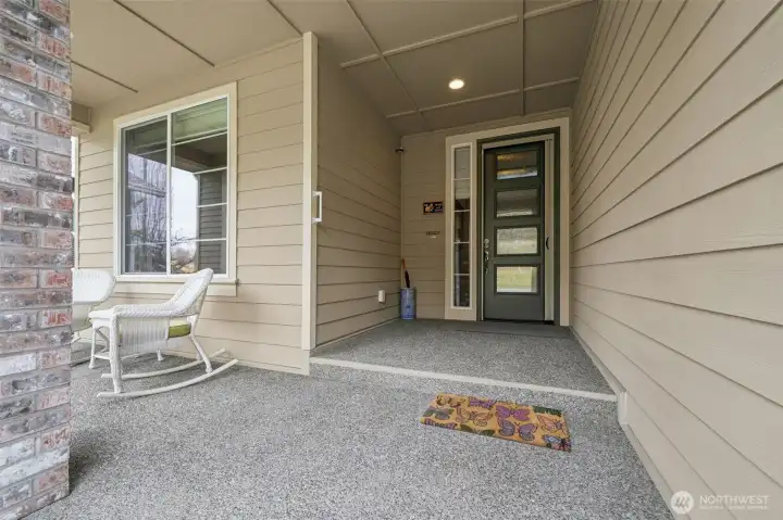 Oversized front porch welcomes you in.