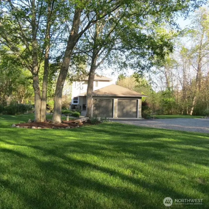 A large and private sun-splashed lot greets you with ample space for RV, boat, pole building, etc.