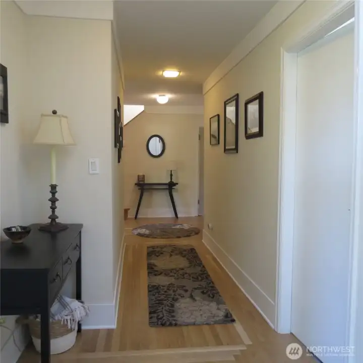 Entrance hallway and the brand new natural wood floors that are throughout the home's main level.