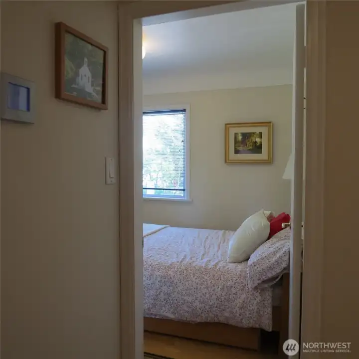 Entering the first of two bedrooms on the main level.