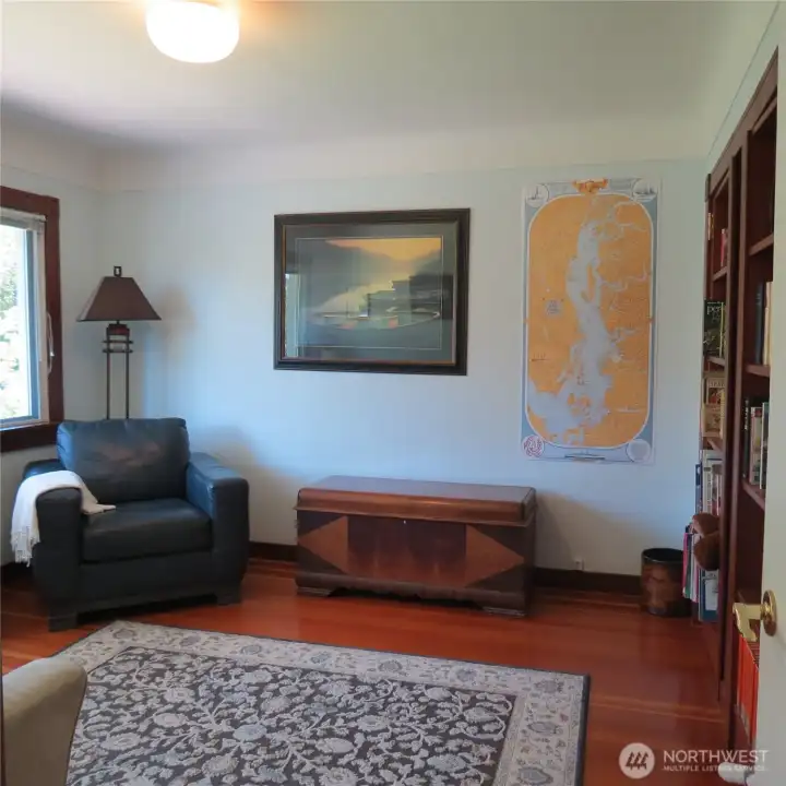 The second possible main level bedroom currently being used as a library/reading room.