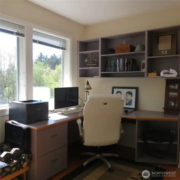 Another possible bedroom on the upper level that is currently being used as an office.