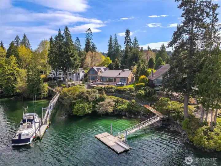Home with the coveted and rare private dock in dreamy Port Ludlow.