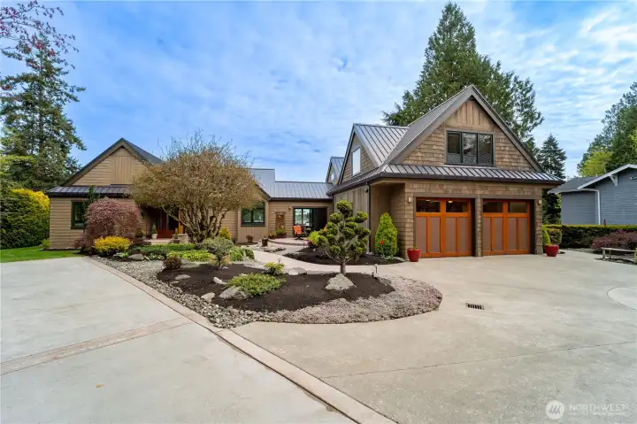 Arrive at your main residence with the generous driveway and space for RV/boat.