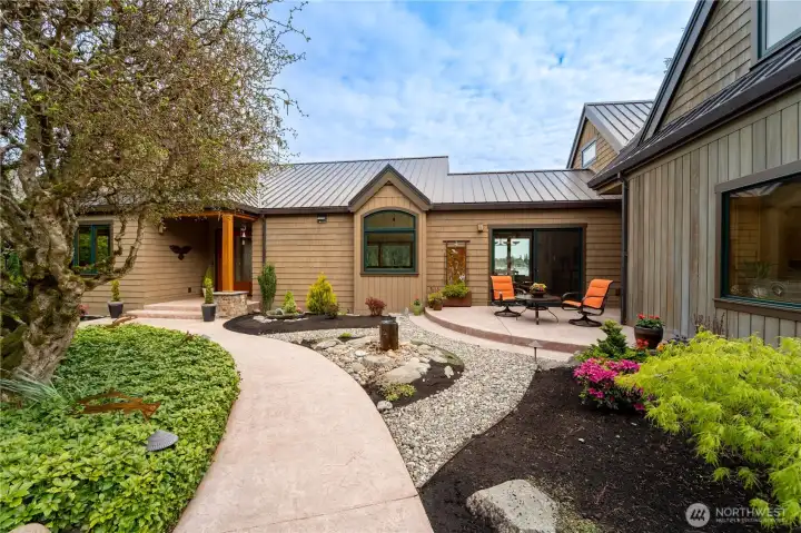 Admire the mature, lush landscaping