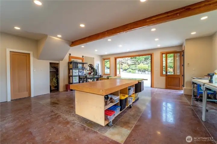 With bifold doors and in-floor dust collection system