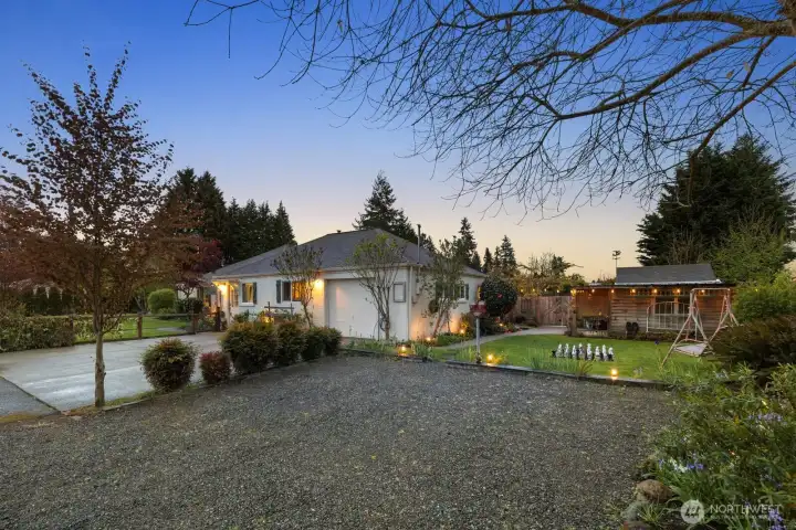 Ample parking and landscape lighting throughout.