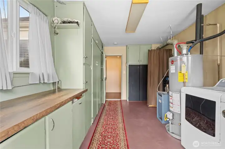 utility room that is located between main house and 3rd bedroom suite/airbnb