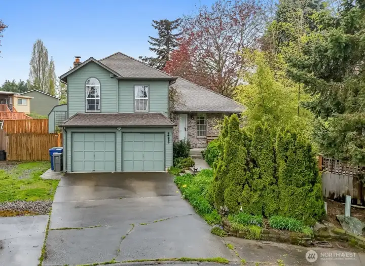 Front phot of the home for sale in this quiet cul de sac