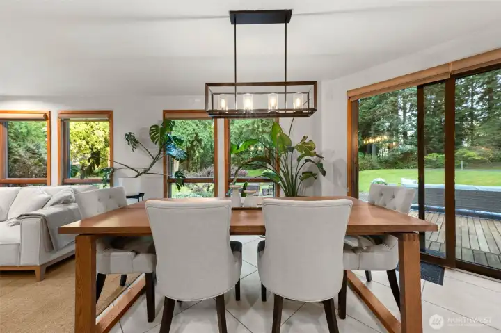 Dining area with back slider that leads to the backyard