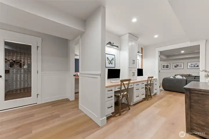 Lower level entertainment suite.  Wine cellar, art room, work stations and movie/game room