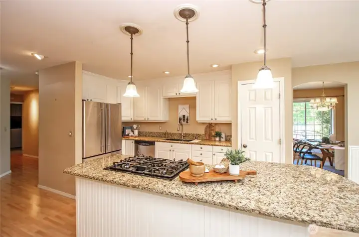 Open Concept Kitchen with SS Appliances and Gas Range