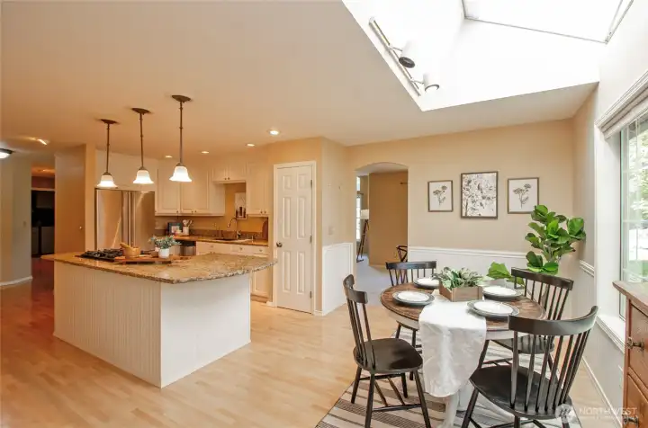 Vaulted Skylights fill the room with light