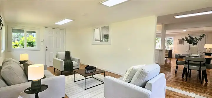 Family Room off Dining has Door to Patio and Backyard