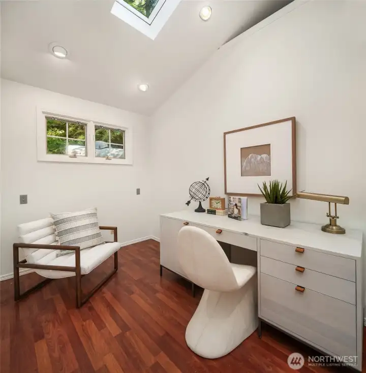 A versatile flex room provides the perfect space for a home office, studio, reading room, or wellness retreat.