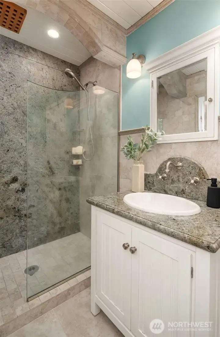 Thoughtfully remodeled bathroom offering timeless materials and refined craftsmanship.
