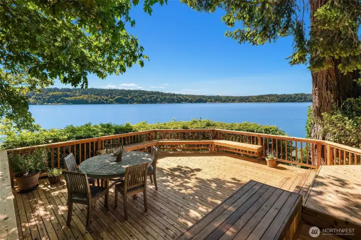A generous entertaining deck extends the living space outdoors, offering front-row seats to life on the water.