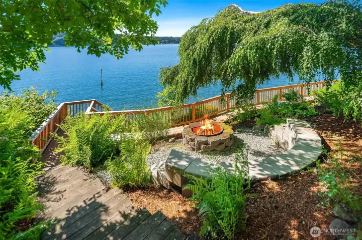 The waterfront firepit creates a natural gathering place for conversation, sunsets, and quiet evenings by the water.