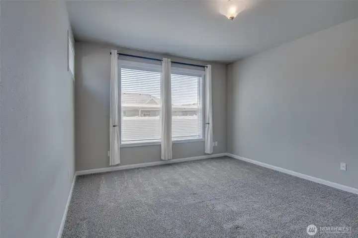 Primary Bedroom-Comfortably fits a King Size Bed