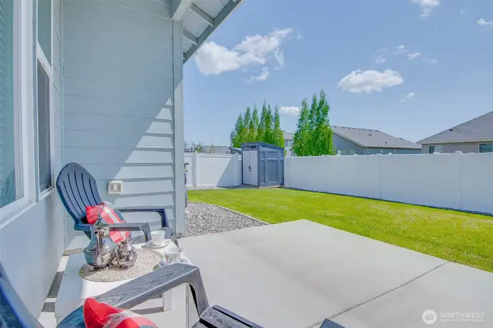 South Facing backyard with comfortable partially covered patio.  Storage shed is in the SE corner.