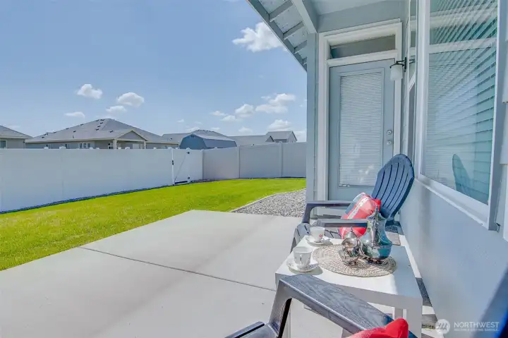 South Facing backyard with comfortable partially covered patio.  Alley Gate is in the SW Corner