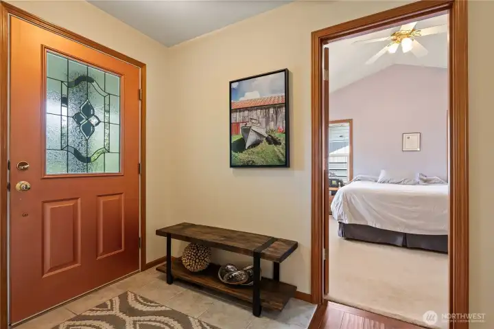Welcoming foyer with elegant front entry.