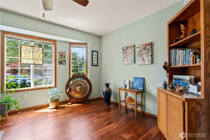Versatile flex room ideal for a home office, den, or hobby space.