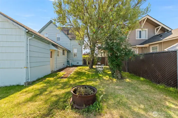 Back yard off the home with access to home and bonus room with hot tub. Back yard off the home with access to home and bonus room with hot tub.