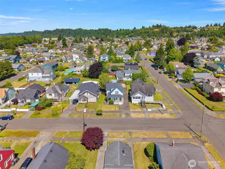 Front aerial view of surrounding neighbors and local residential area. Front aerial view of surrounding neighbors and local residential area.