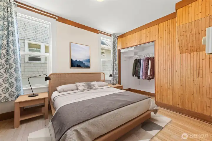 Main floor bedroom is located off the dining room and could be considered the primary. Virtually staged. Main floor bedroom is located off the dining room and could be considered the primary. Virtually staged.