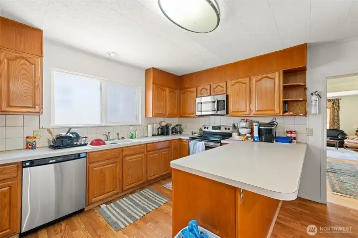 Kitchen off the dining room area. Kitchen off the dining room area.