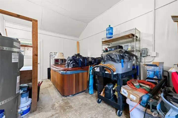 Off the utility room is an extra bonus room with a working hot tub that stays with the sale of the property. All other items to be removed before closing. Off the utility room is an extra bonus room with a working hot tub that stays with the sale of the property. All other items to be removed before closing.
