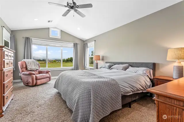 Private primary bedroom with walk-in closet