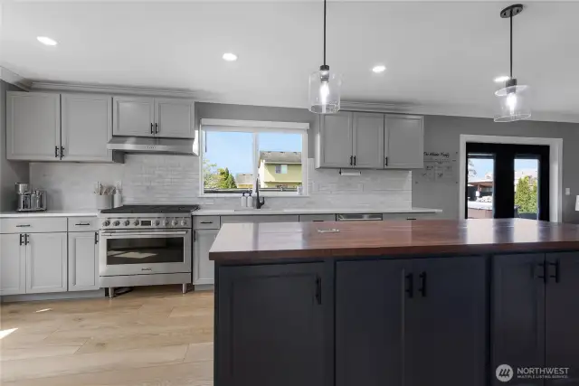 Luxurious Chefs Kitchen with an entertainers dream of a large island with power.