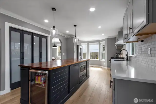 Island Has build in Microwave, Beverage Fridge, and Storage on both sides. Did we mention the kitchen also has a Pantry?