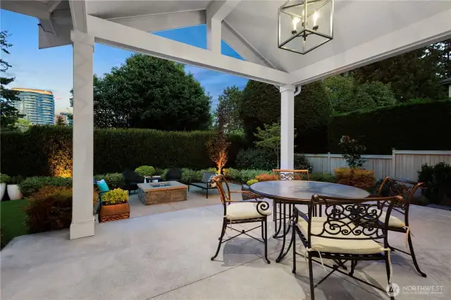 Enjoy year-round outdoor living on the covered patio, complete with a stub for a natural gas grill, a gas fire pit, Klipsch speakers for excellent sound, and stunning city views.