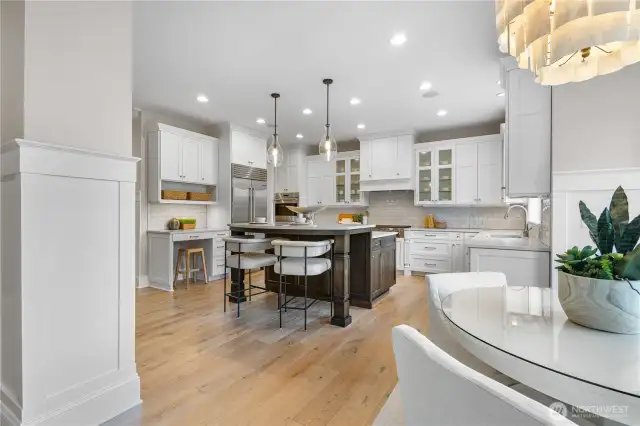 They say everyone ends up in the kitchen during a party — and in this one, there's plenty of space for everyone to gather and mingle in style!